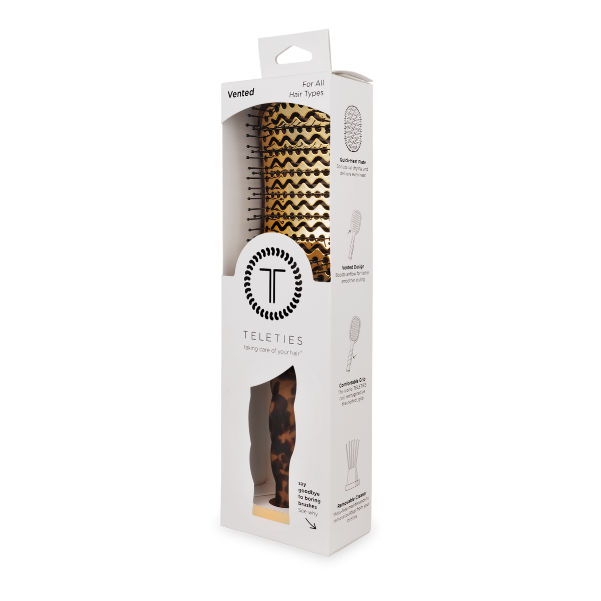 Boxed Vented Hair Brush | Tortoise by TELETIES, featuring a brown and gold chevron pattern, suitable for all hair types. Includes quick-heat aluminum plate for smooth blowouts. Primarily white packaging with product details and feature illustrations. Sizes available: standard and mini.