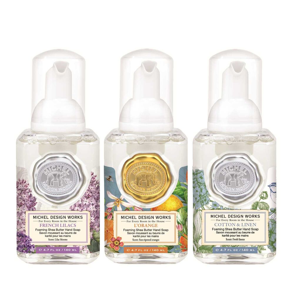 Set of three mini foaming hand soaps, 1.8 oz each, in French Lilac, Orange, and Cotton & Linen scents with floral labels.