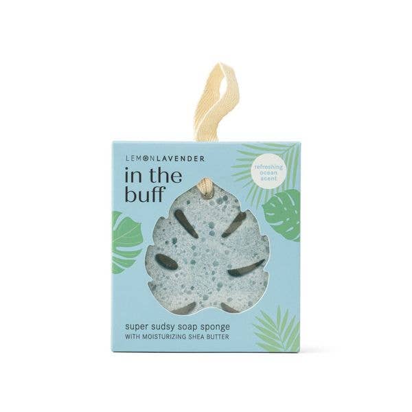 Blue, leaf-shaped exfoliating sponge with shea butter in light blue box; sizes: standard and large.