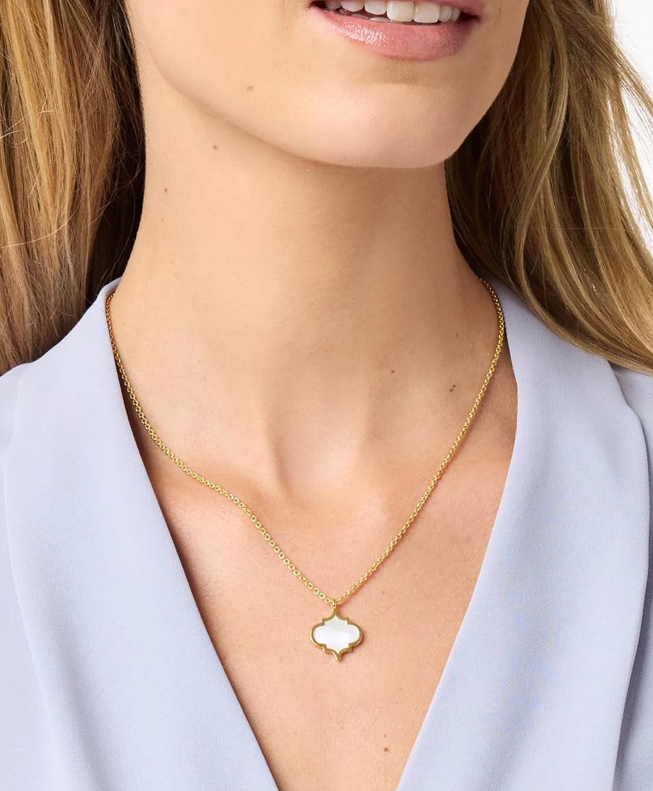 The Helene Inlay Delicate Necklace features a heart-shaped pendant. This elegant piece can be paired with any outfit, offering a subtle touch of sophistication. The necklace is available in one standard size.