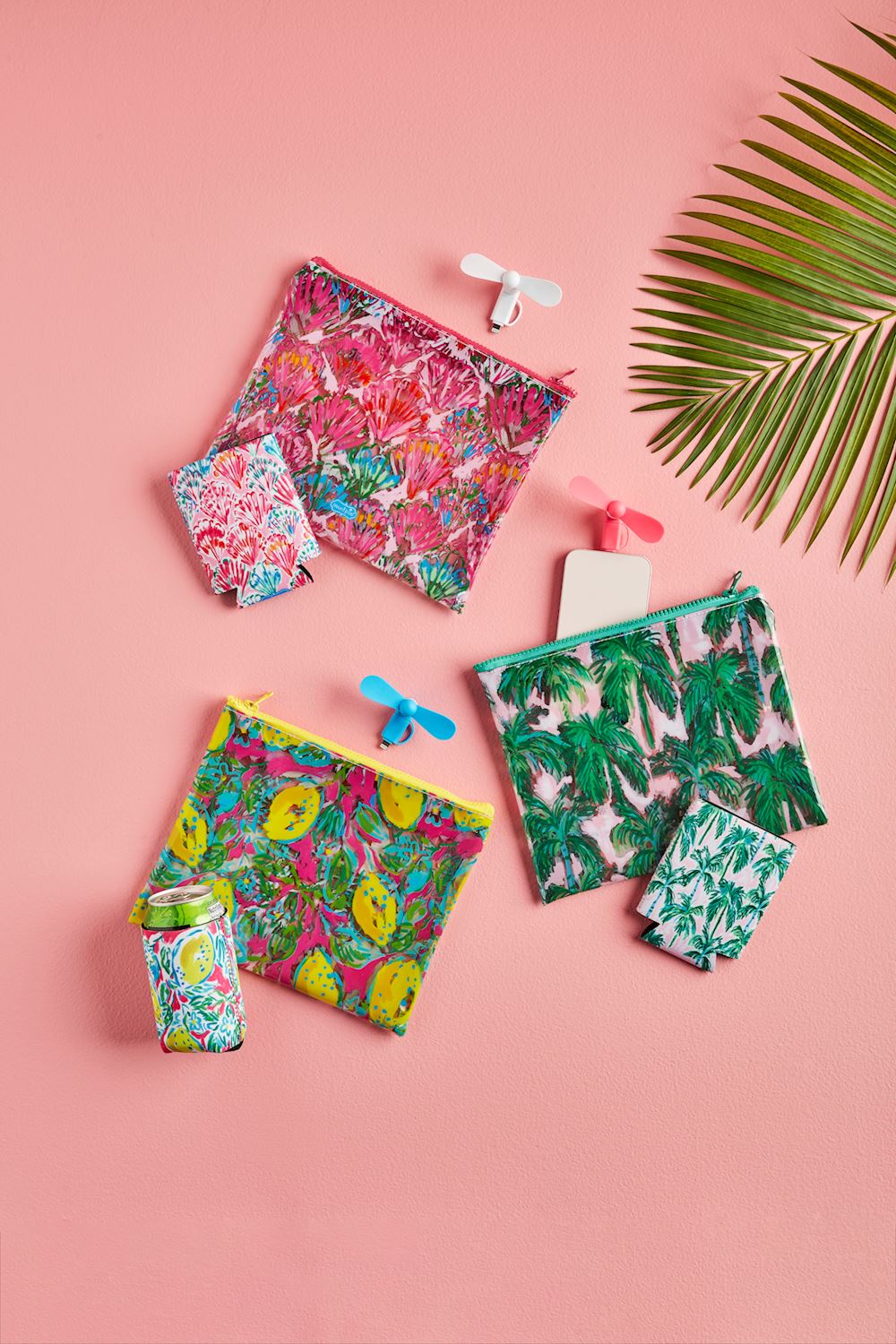 Beach Pouch Set: Colorful vinyl zipper cases in tropical prints, available in small, medium, and large sizes.