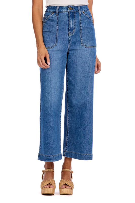 Fritz Cropped Wide Leg Jeans in blue feature a high-waisted fit, wide legs, and oversized front pockets. Available in sizes 24-32.