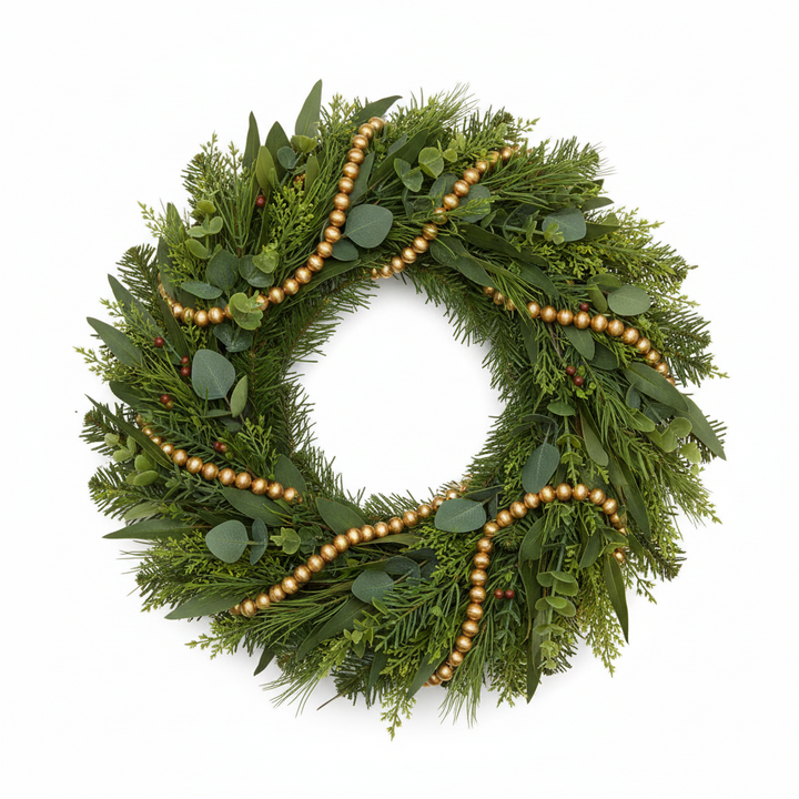Holiday wreath of evergreen needles and eucalyptus with Handmade Embossed Metal Ornament Garland, red berries, and gold beads.
