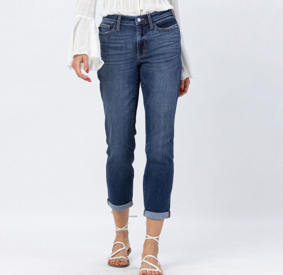 Judy Blue Midrise Cuffed Boyfriend Jeans available in sizes 0-24W. White long-sleeved blouse with flared cuffs available in sizes XS-3XL.