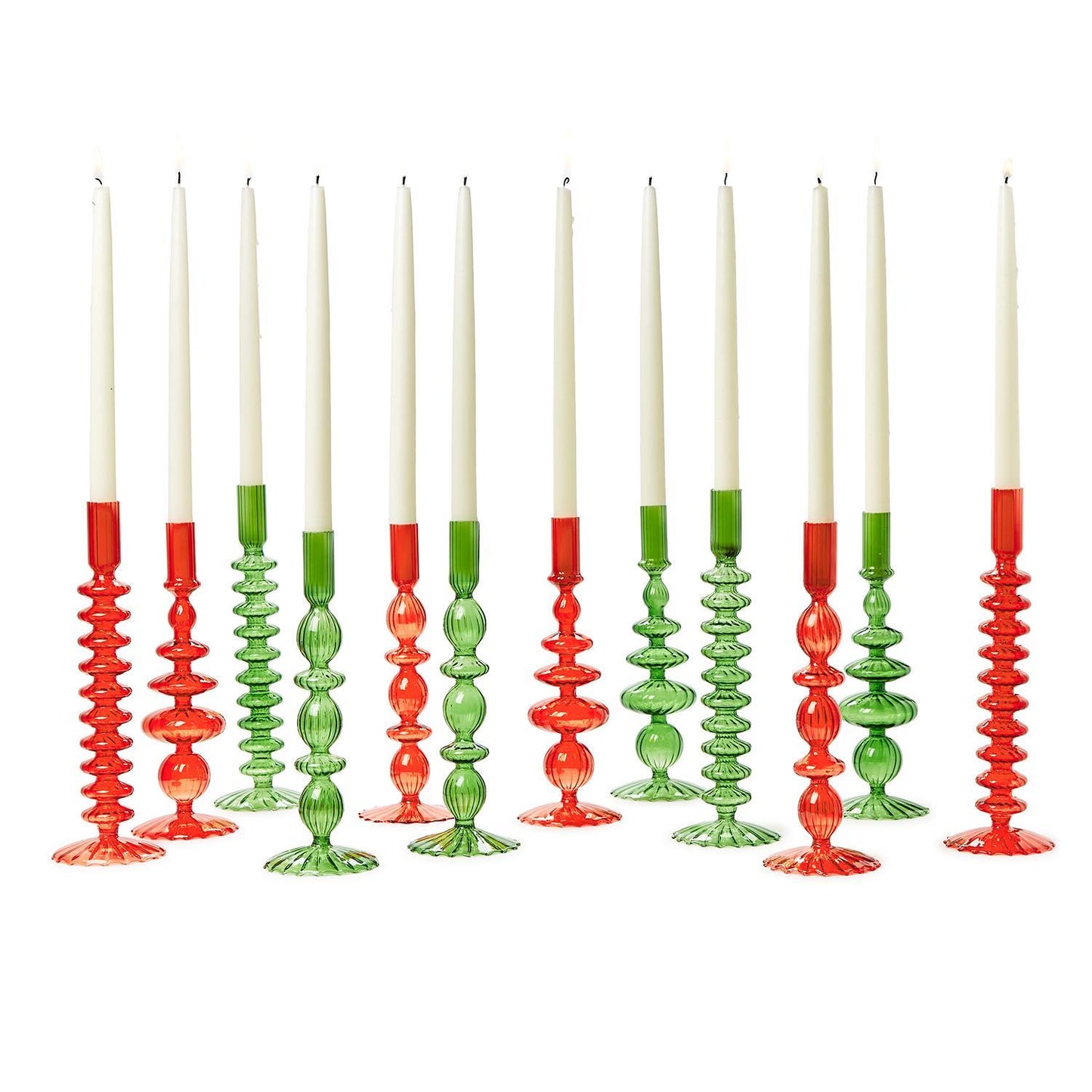 Eleven hand-blown glass candlesticks in red and green with white taper candles, featuring spiral and bulbous designs. Sizes: Standard height of approximately 10-12 inches.