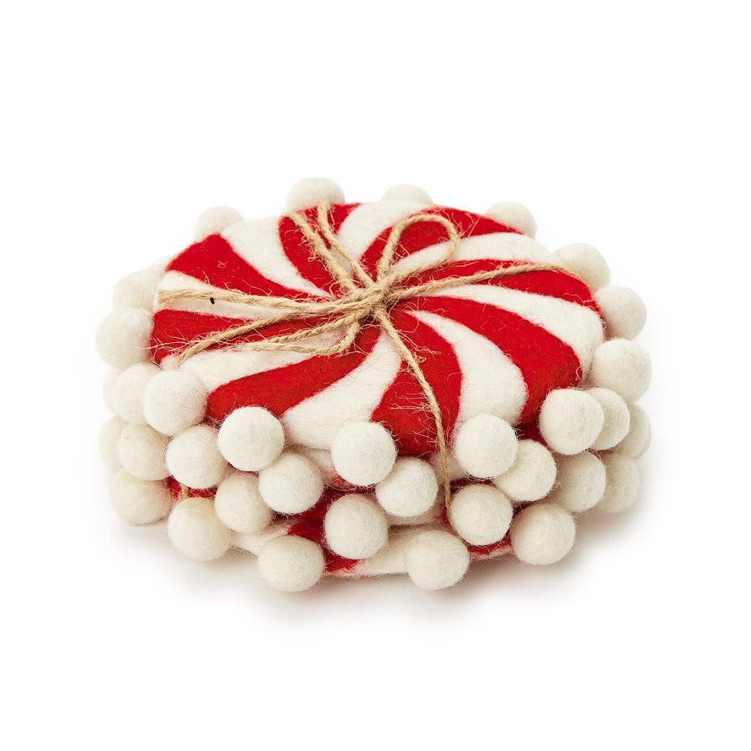 Set of 4 hand-crafted felt coasters with pom-pom, red and white spiral pattern, white pom-pom border, tied with twine.