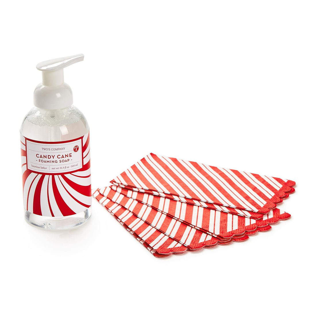 Peppermint scented foaming soap in a candy cane striped bottle and 20-piece guest towels set with red and white stripes and scalloped edges.