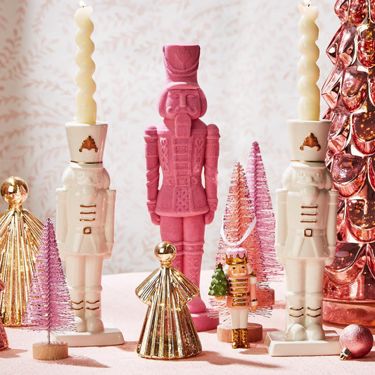 Flocked Nutcracker in pink with other Christmas decor.