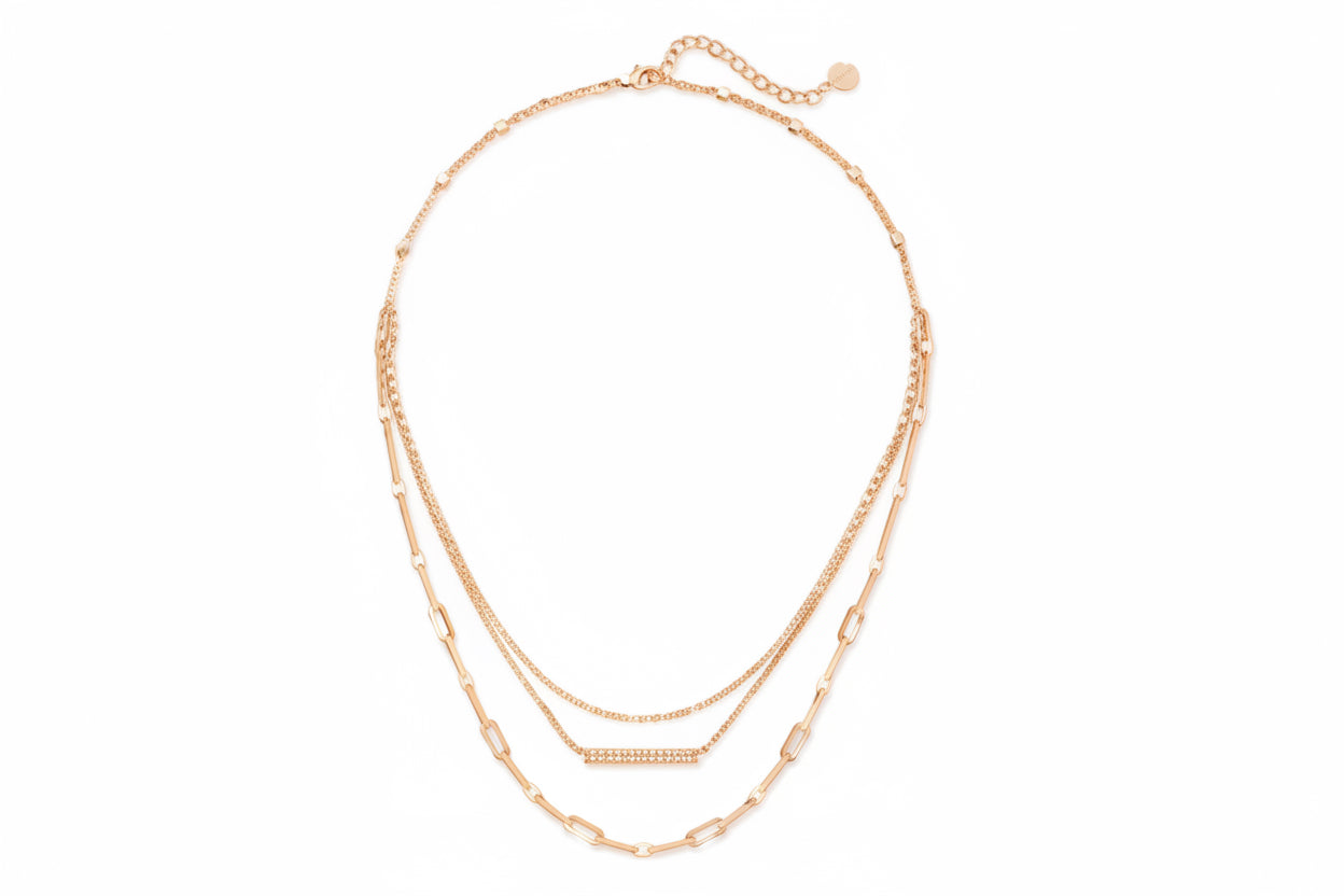 Triple strand gold necklace with light blue stone bar pendant. Available sizes: 16", 18", 20".
