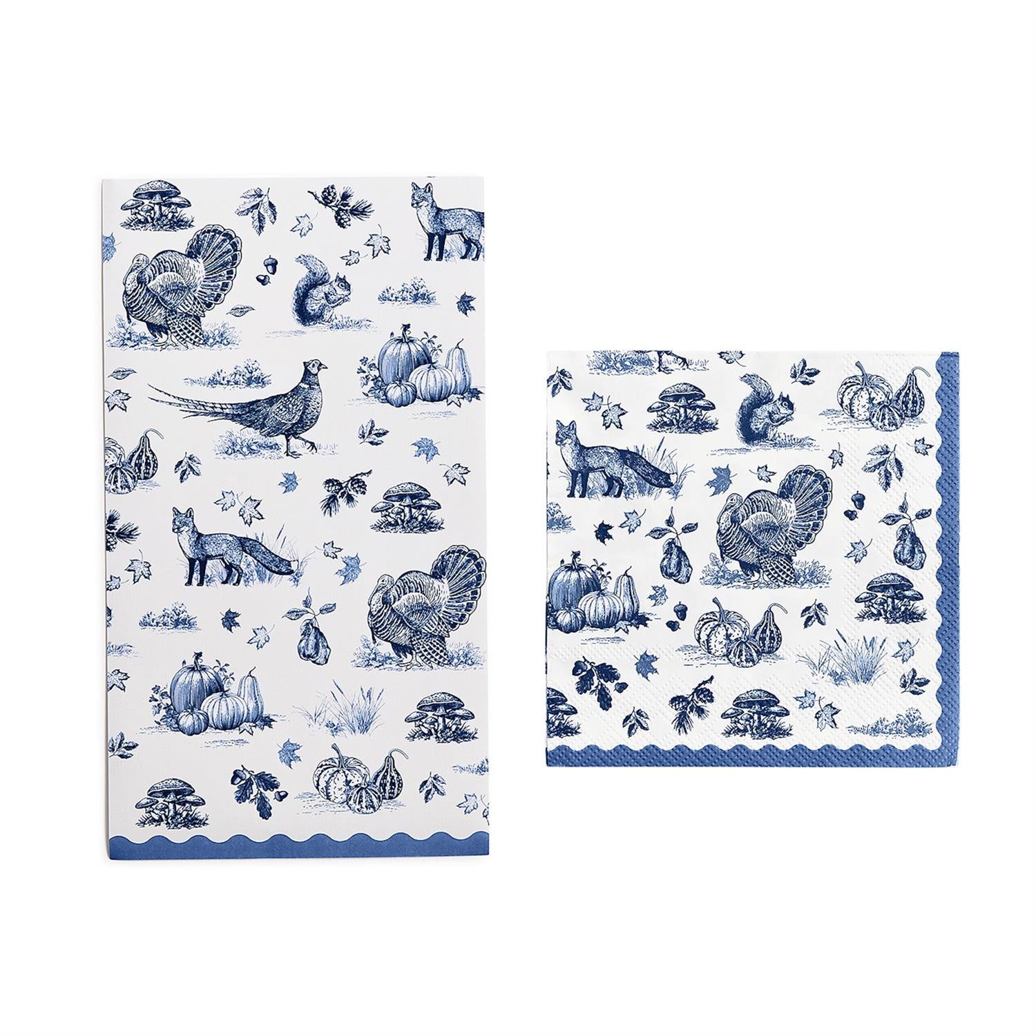 Set of two Falling for Blue Toile Paper Napkins in crisp white with a blue toile-style autumn motif; includes one rectangular and one square napkin.