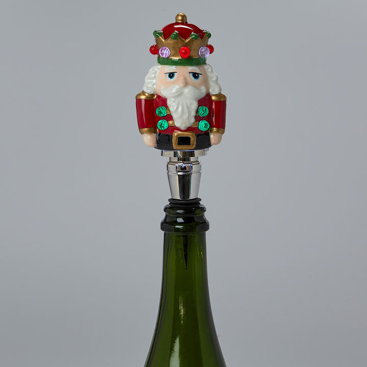 Light-Up LED Nutcracker Bottle Stopper with lighted crown and belt.