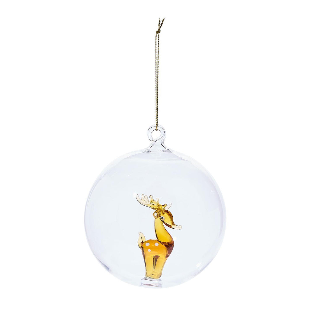 Amber-colored glass deer figurine inside a clear glass ball ornament.
