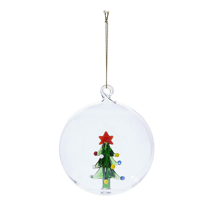 Artisan ornament: clear glass globe with miniature green glass Christmas tree, red star topper, and multicolored bead ornaments.