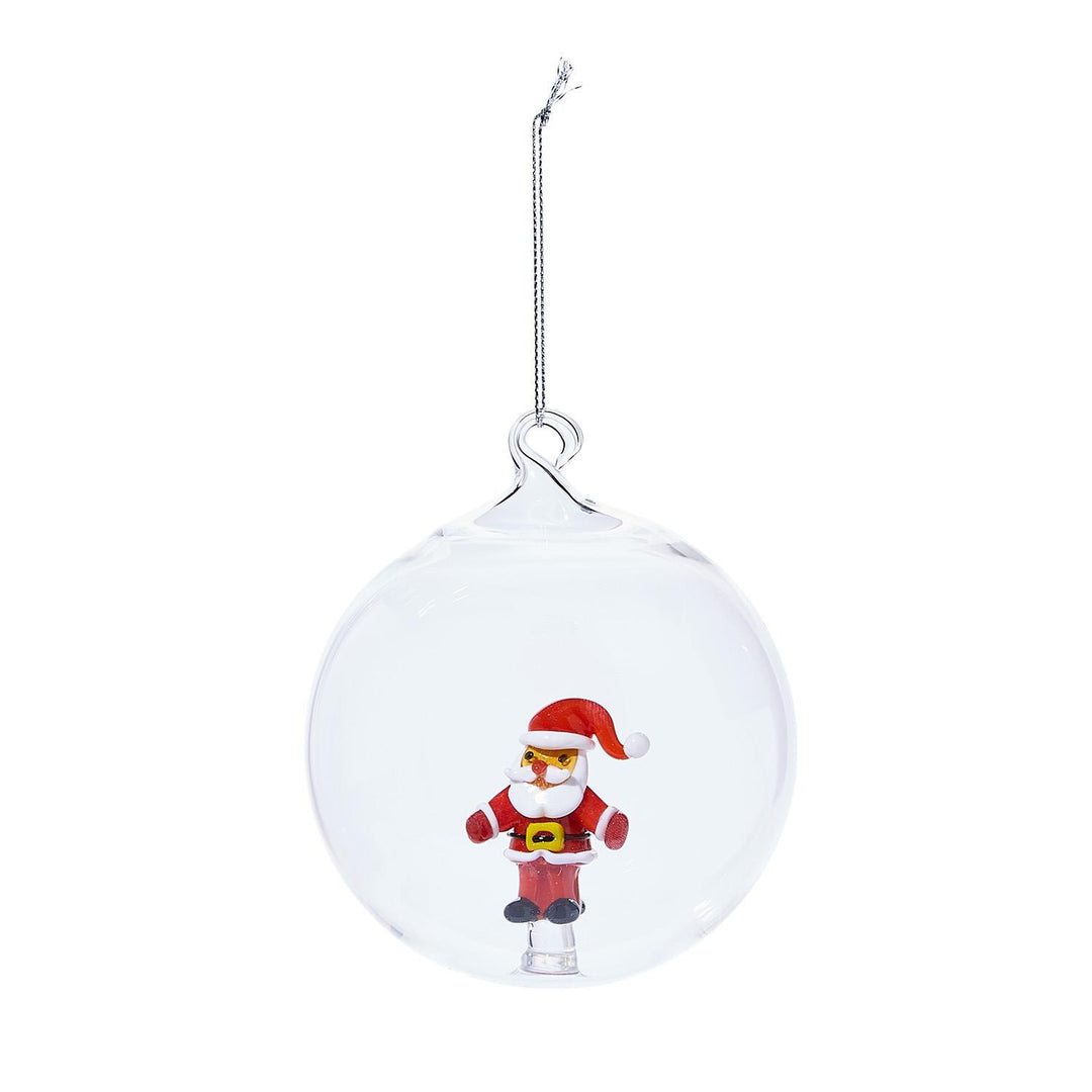 Clear glass spherical ornament with Santa Claus figure on a silver string.