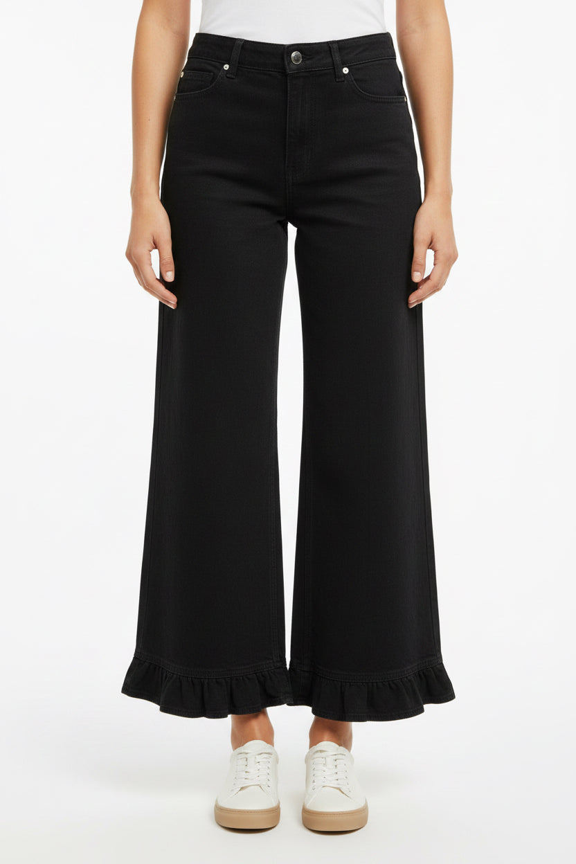 Mineral Washed Ruffle Hem Wide Leg Pants with ruffled hems; available in sizes XS-XL.