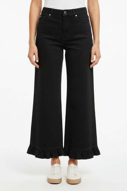 Mineral Washed Ruffle Hem Wide Leg Pants with ruffled hems; available in sizes XS-XL.