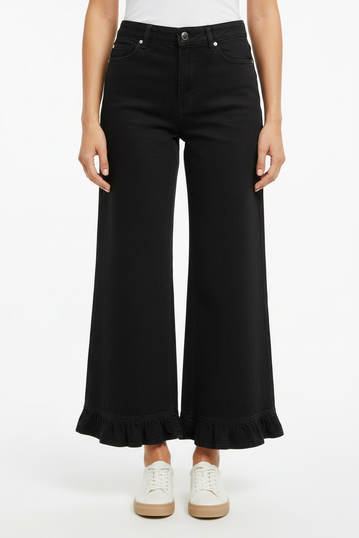 Mineral Washed Ruffle Hem Wide Leg Pants with ruffled hems; available in sizes XS-XL.