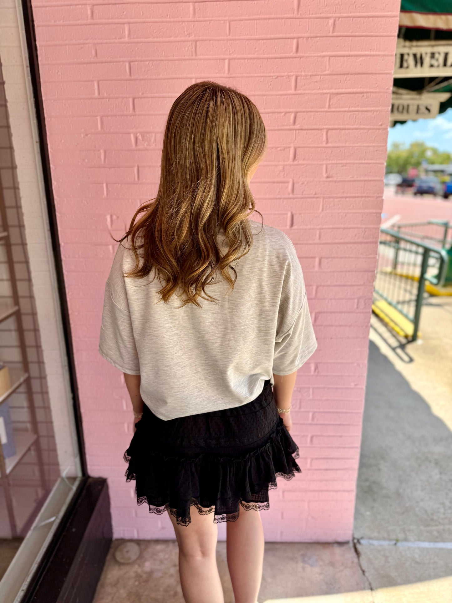 Gameday Gingham Football Patch Top shown; available in sizes S-XL.
