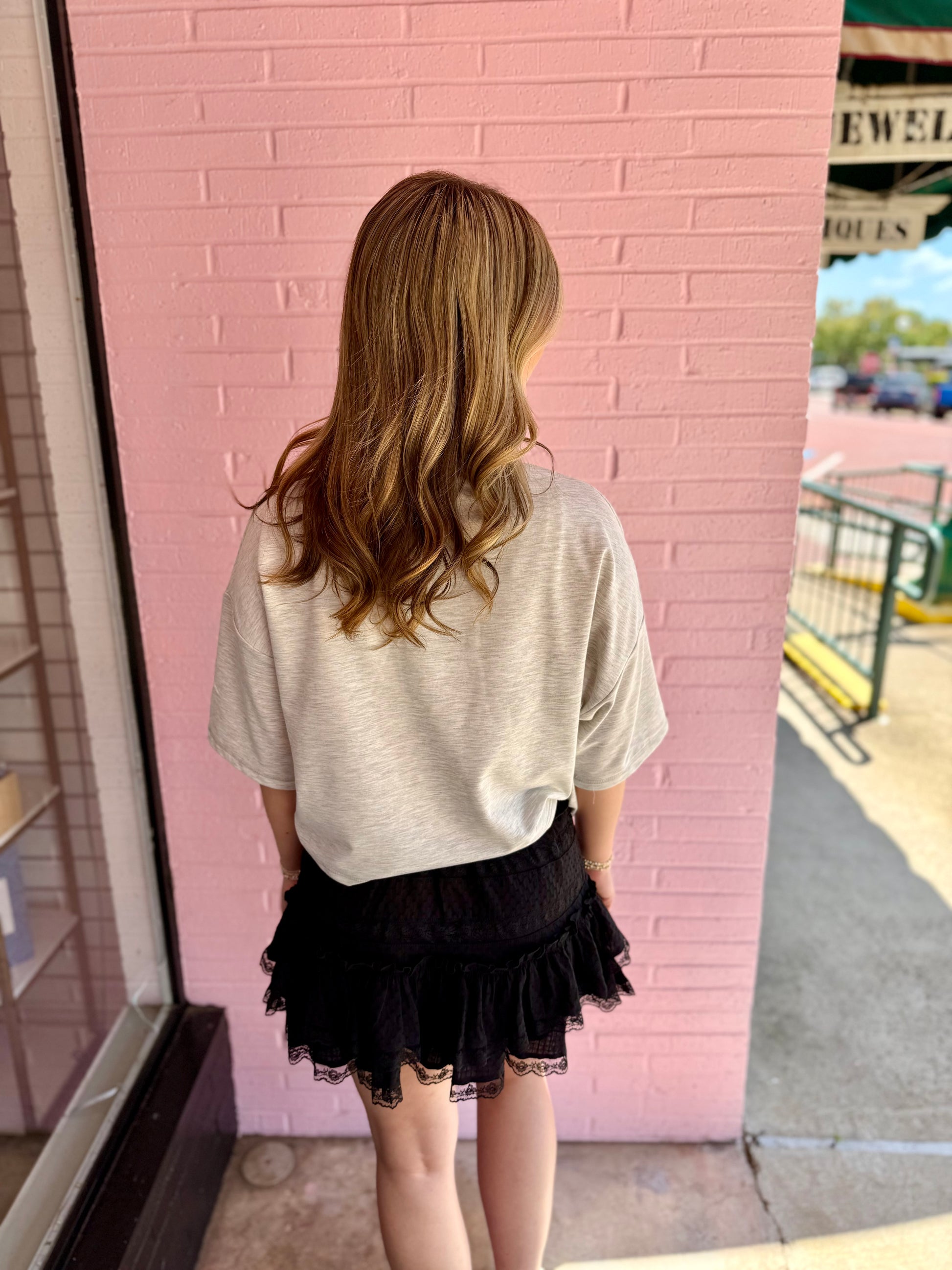 Gameday Gingham Football Patch Top shown; available in sizes S-XL.