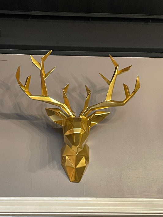 Gold Deer Head Mount: Elegant decor piece with faceted surfaces for a modern, abstract appearance. Sizes available: Small, Medium, Large.