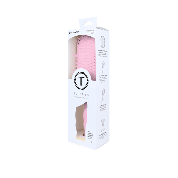 Bubblegum pink Detangler Brush, Medium, in packaging.