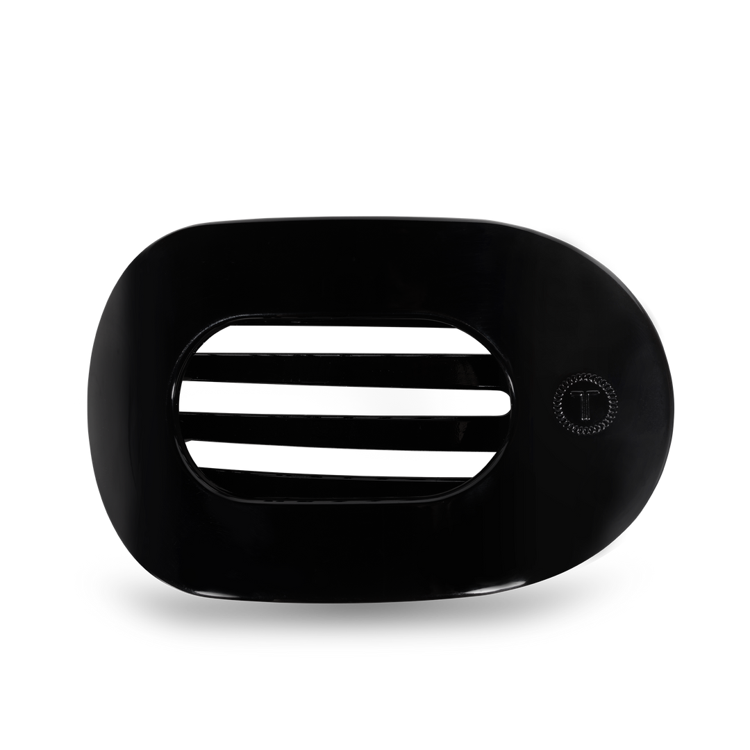 Black oval TELETIES Flat Round Hair Clip with slats and right-side “T” button. Available in small, medium, and large sizes.