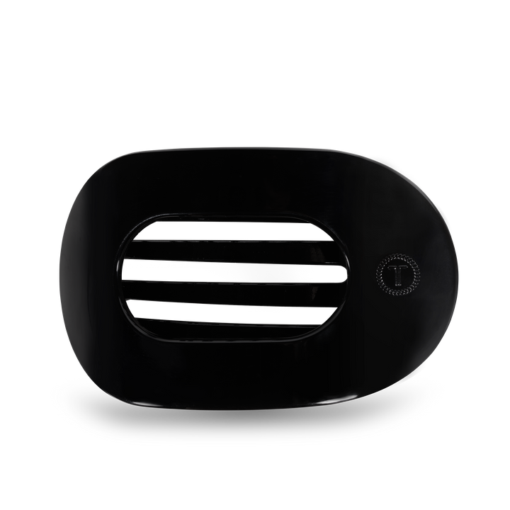 Black oval TELETIES Flat Round Hair Clip with slats and right-side “T” button. Available in small, medium, and large sizes.