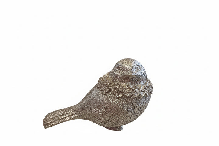 Textured metallic gold resin bird figurine.