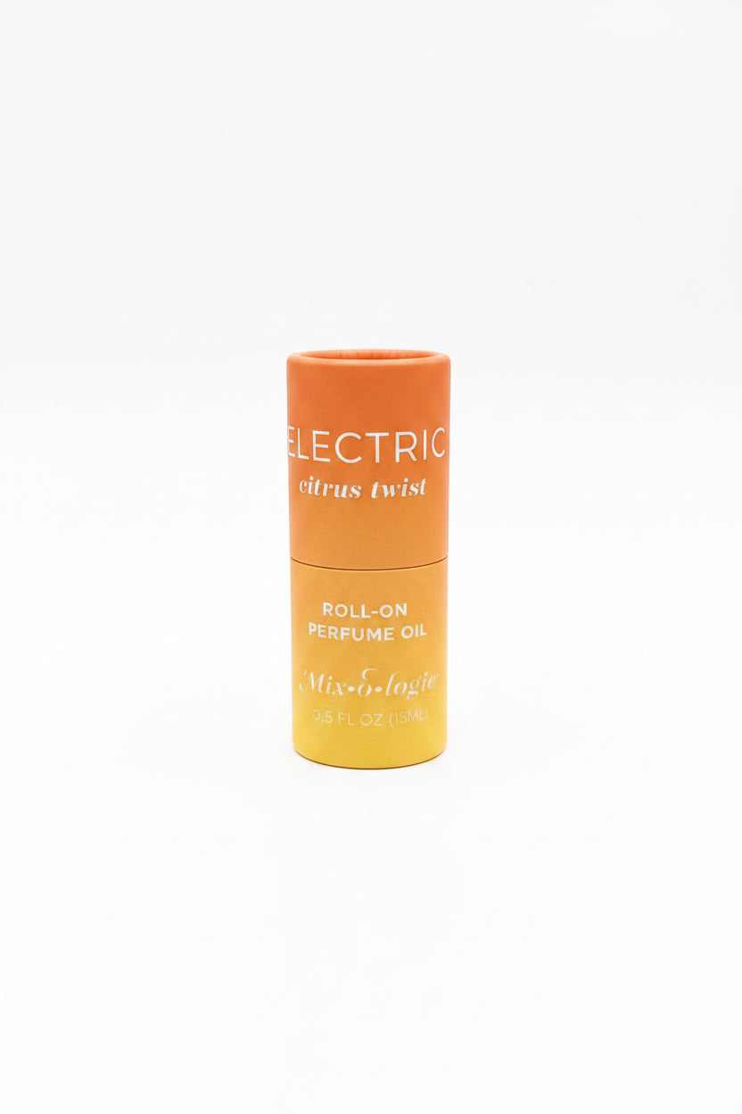 Cylindrical orange Keychain Mini Rollerball Perfume, available in 5ml and 10ml sizes.