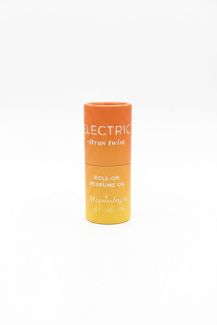 Cylindrical orange Keychain Mini Rollerball Perfume, available in 5ml and 10ml sizes.