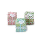 This product includes three Floral Block Wrapped Soaps. Each soap features an intricate floral block print pattern and is tied with a matching ribbon and personalized tag. The soaps are available in standard size.