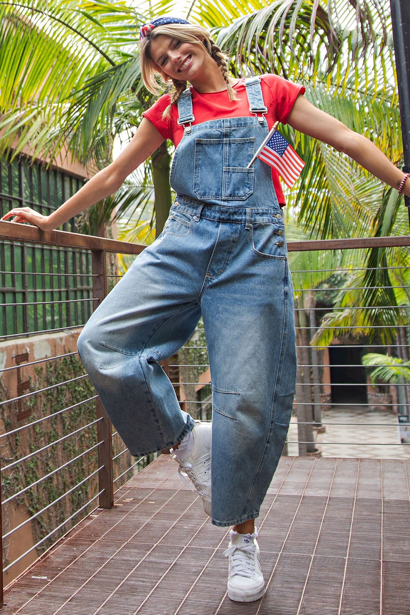 Dakota Mineral Wash Denim Jumpsuit; available in sizes XS-XL.
