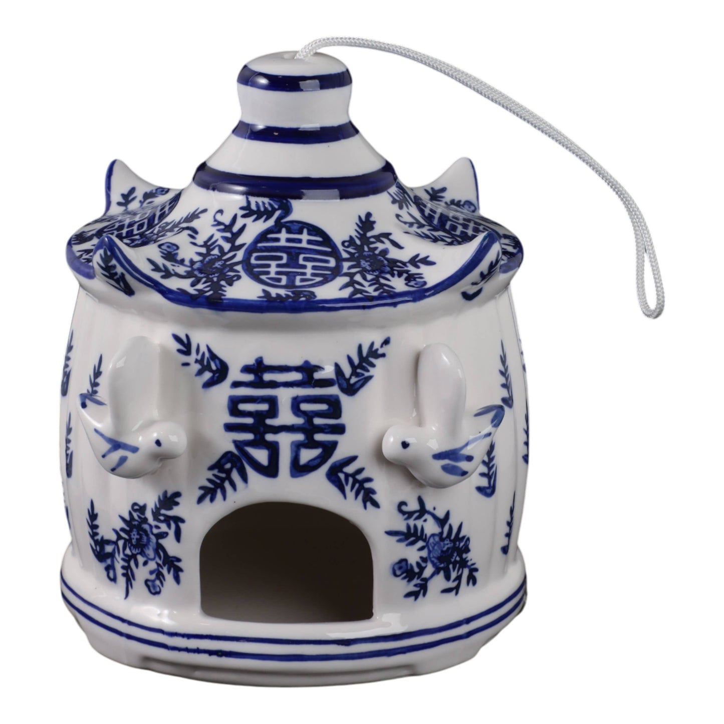 White/blue chinoiserie pagoda birdhouse, 8 in., with blue floral motifs, two bird figurines, and a hanging string.