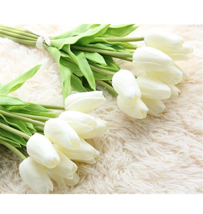 Artificial tulip bundles with green stems and leaves. Available in 12-inch and 16-inch sizes.