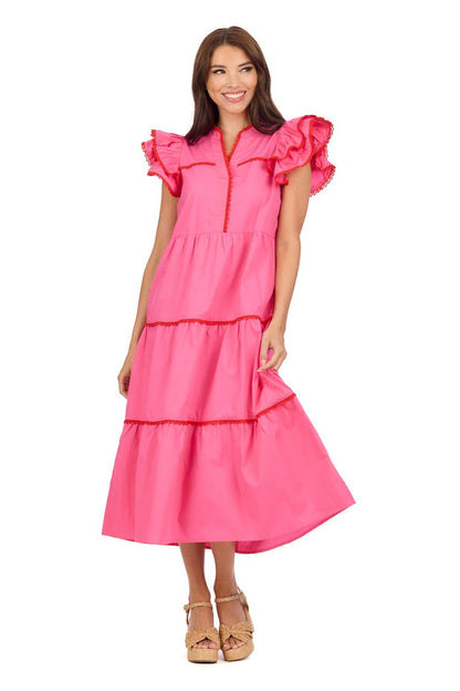 The Pia Ric Rac Midi Dress features bright pink cotton poplin, ruffled sleeves, and a playful design. Available in sizes XS to L.