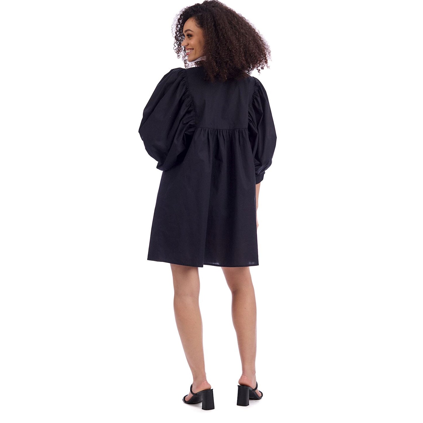 Black Shipley Dress shown; available in XS–XL.
