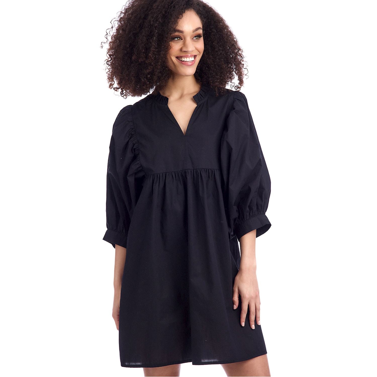 Black Shipley Dress: loose-fit, knee-length cotton poplin, three-quarter sleeves, slight V-neck. Available in sizes XS–XL.