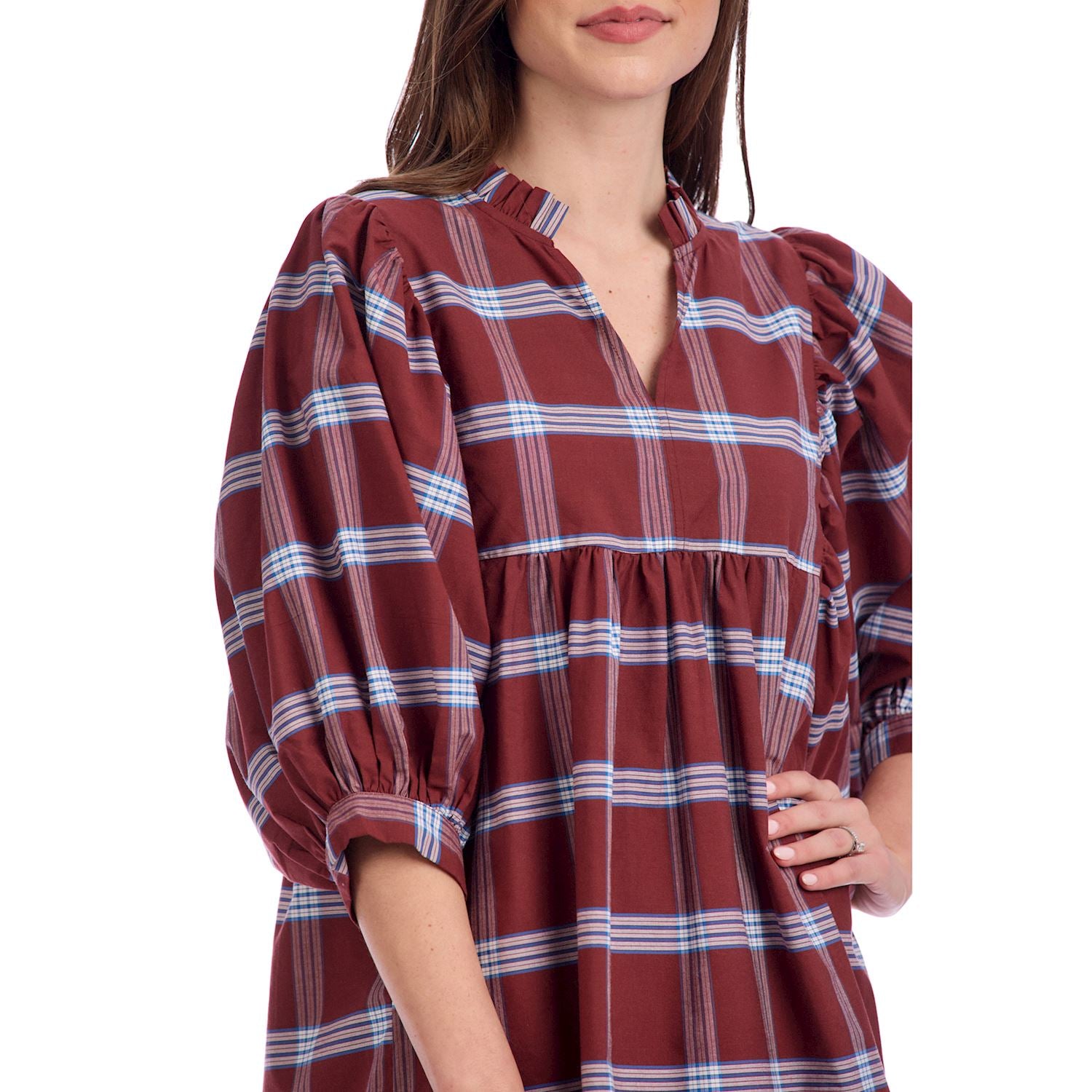 Brown Shipley Dress in brown and blue plaid with puff three-quarter sleeves, v-neckline. Available in sizes XS-XL.