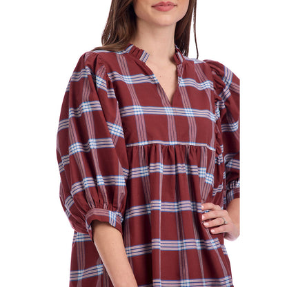 Brown Shipley Dress in brown and blue plaid with puff three-quarter sleeves, v-neckline. Available in sizes XS-XL.