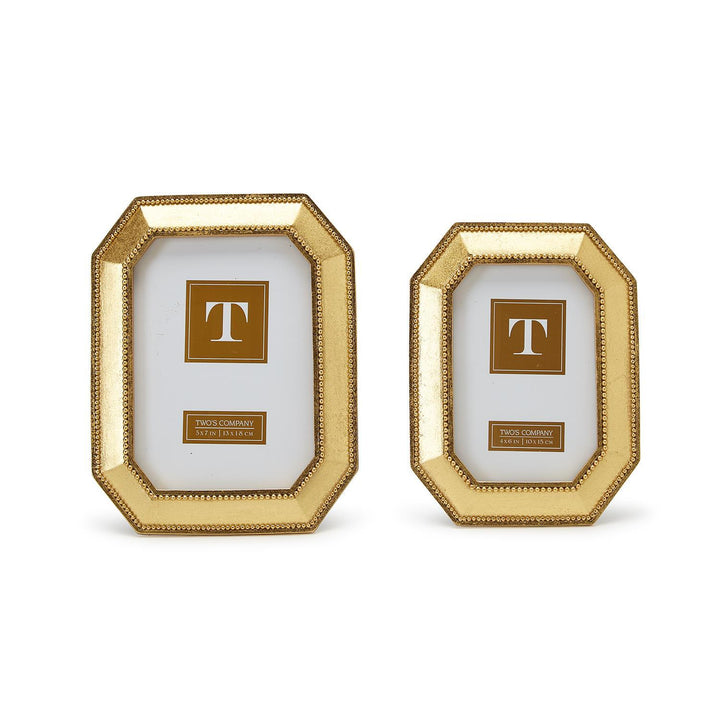 Two octagonal gold bead-detailed photo frames in two sizes, each with a placeholder featuring a gold "T" on white.