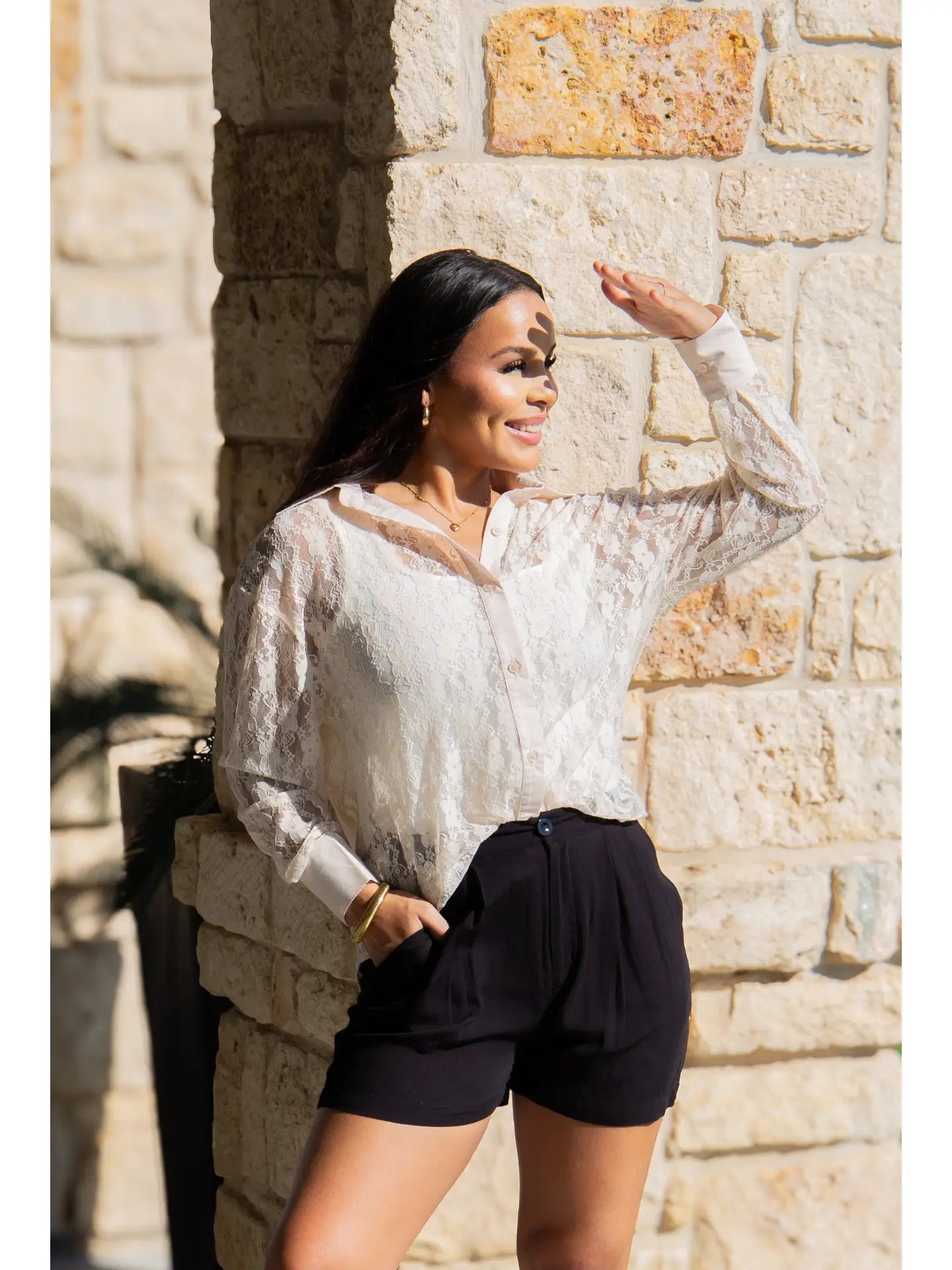 Kathryn Classic Lace Button-Up, available in sizes XS-XL, features delicate lace detailing and a button-up front.