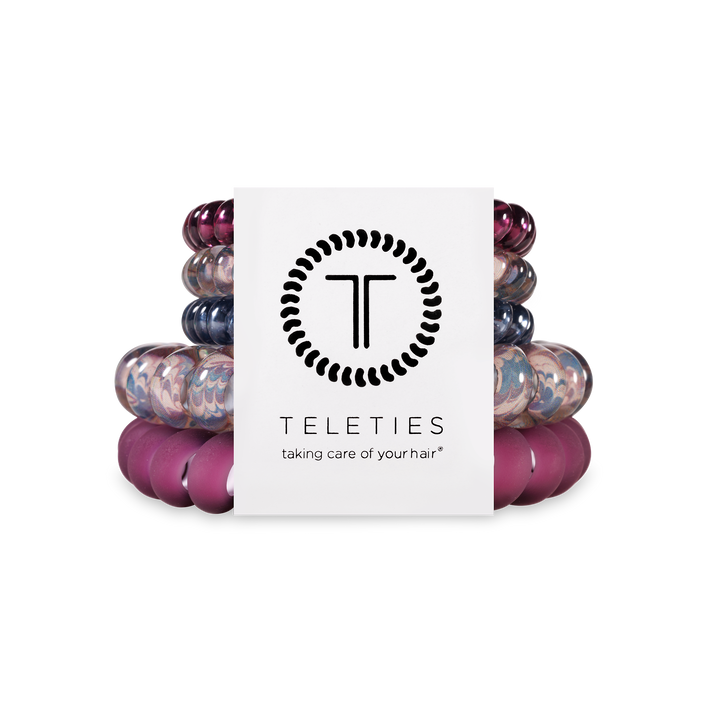 TELETIES Hair Ties in purple, pink, and marbled colors; available in multiple sizes. Includes branded white packaging.