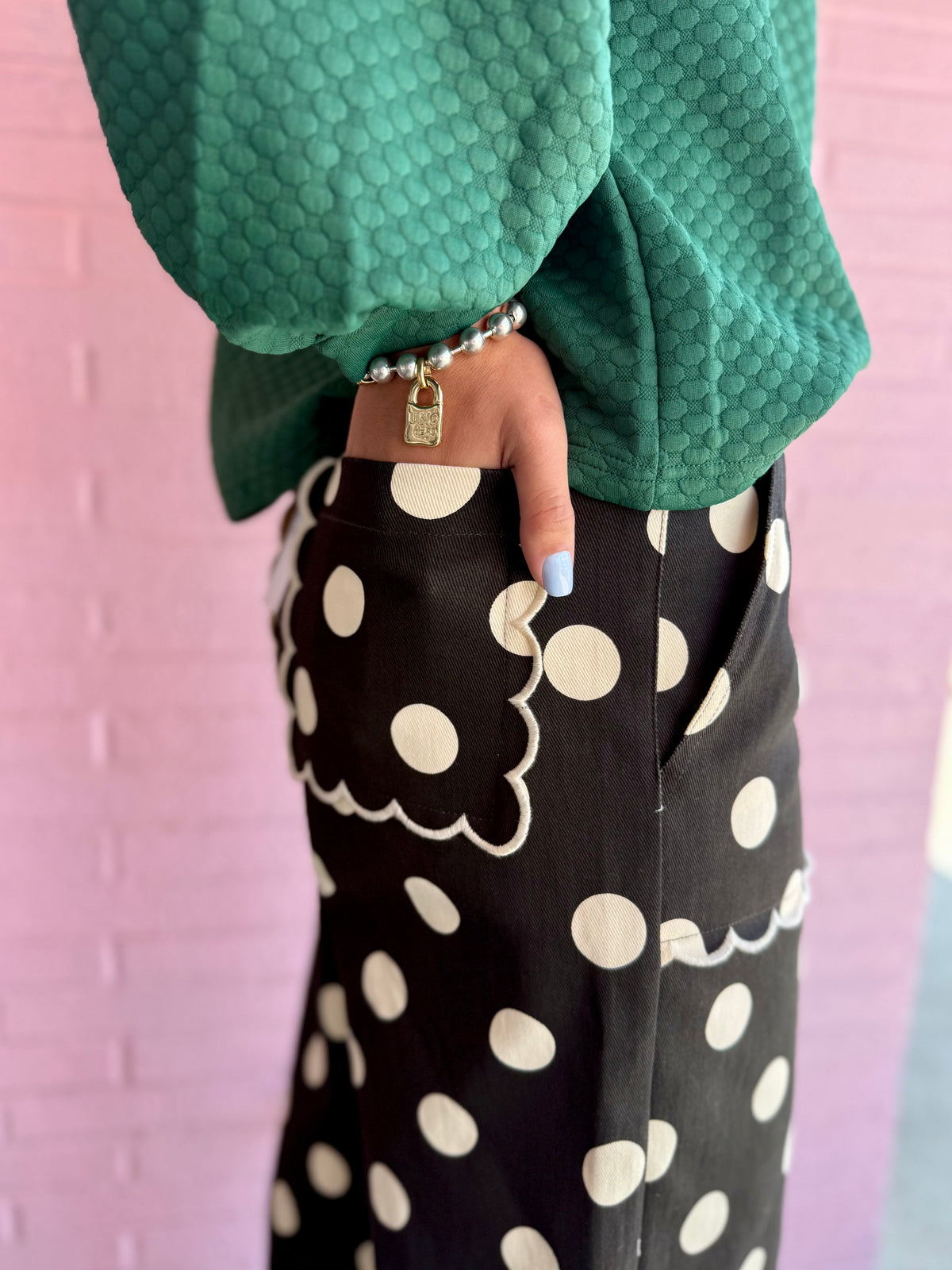Polka Dot Scalloped Jeans in black-and-white with scalloped pockets. Available in sizes 24–32.