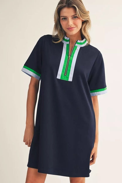 Short Sleeve Navy Zip Up Dress with white and green trim; available in sizes XS–XL.
