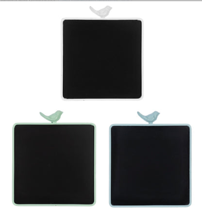 Chalkboard sign with colored border (white, green, or blue) and bird figurine. Available in small, medium, and large sizes.
