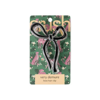 Black "very demure bow hair clip" from The Crush. Sizes available. Simple, effortless styling.