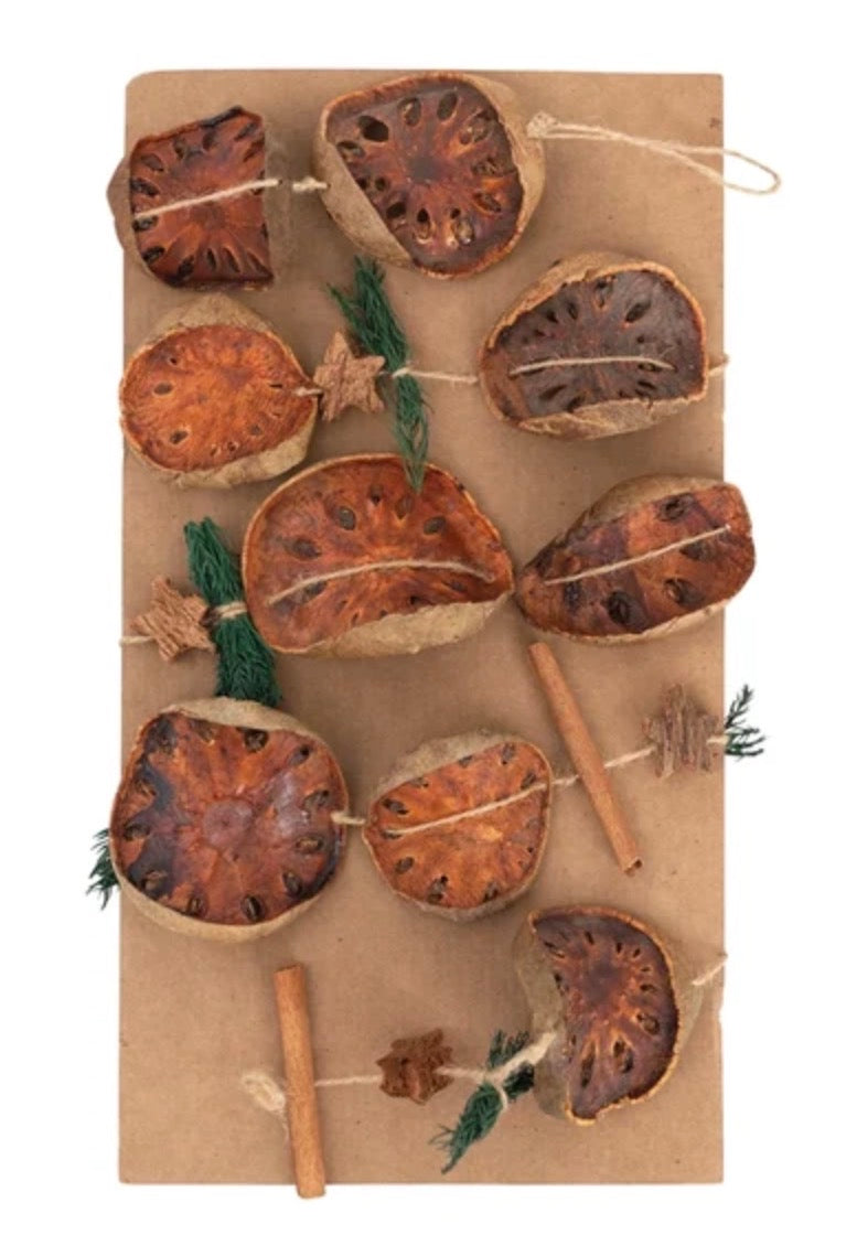 72” dried garland with dried fruit slices, cinnamon sticks, and wooden star accents.