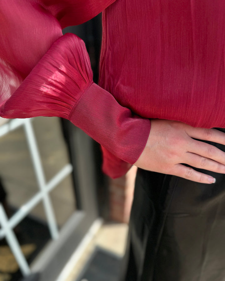 Shiny red Ruffle Neck Adjustable Tie Long Sleeve Blouse with gathered cuffs, available in sizes XS-XL.
