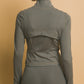Active Long-Sleeve Zip-Up Performance Top and Leggings in olive green, made from buttery soft fabric. Available sizes: XS, S, M, L, XL.