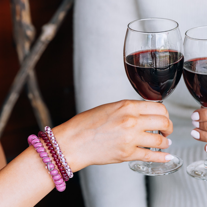 Merlot after Midnight Large Hair Tie on wrist; available in large size.